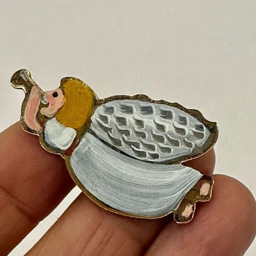 Nancy Thomas flying angel pin